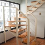 Escalera de madera giro U fabricada e instalada por Escalímetro LTDA